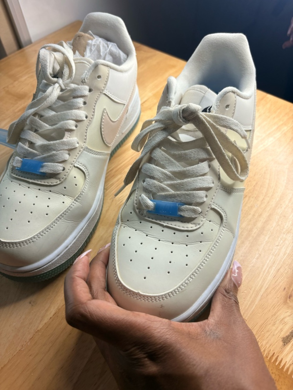 Nike Low-Top Sneakers — Cream with Pale Pink Swoosh. UV COLOR. CHANGING